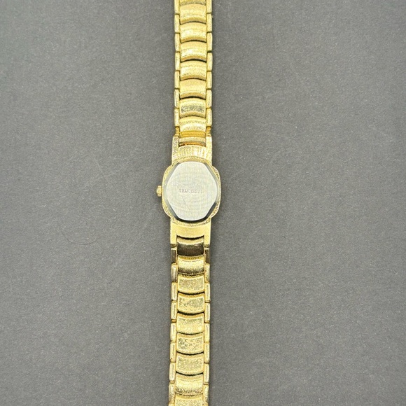 Ronica gold tone ladies watch with rhinestone accents. - Picture 5 of 5